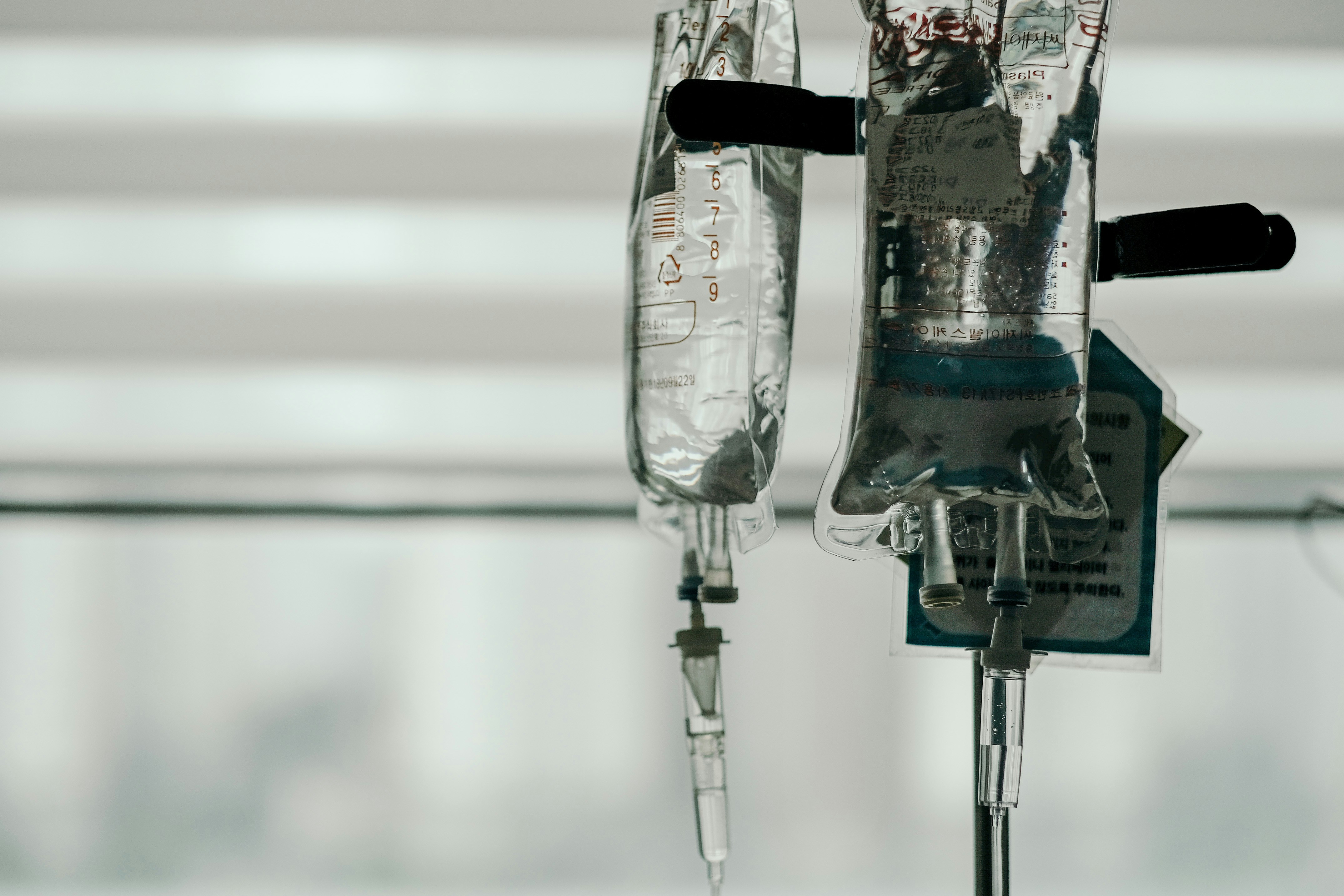 IV bags hanging from an IV pole.